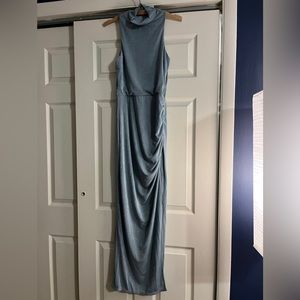 Stretchy blue dress with sparkle within the fabric. Very flattering.